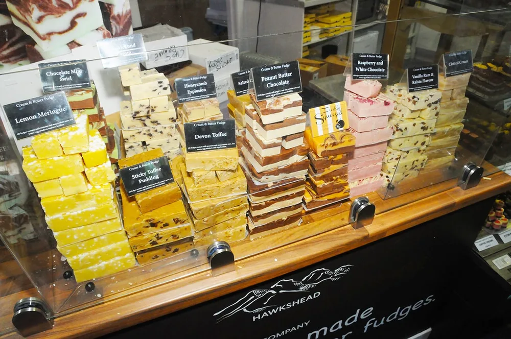 Slabs of fudge in many flavours on the shop counter